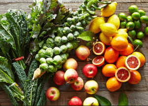 a group of fruits and vegetables on a wood surface Healthy Weight Loss Diets St Neots